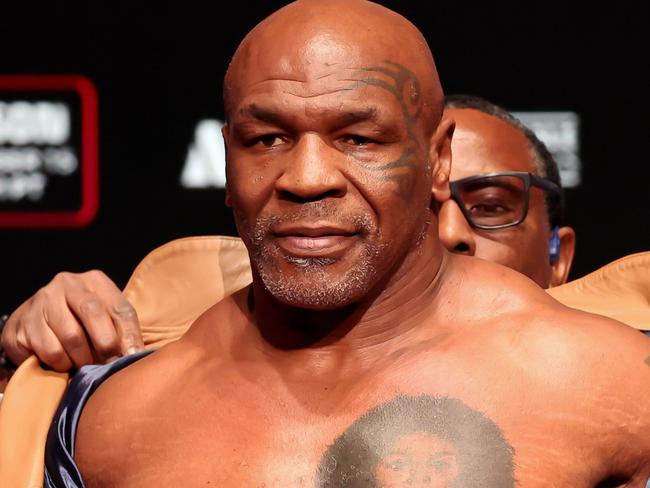 DALLAS, TEXAS - NOVEMBER 14: Mike Tyson attends the weigh-in for LIVE on Netflix: Jake Paul vs. Mike Tyson at the Toyota Music Factory on November 14, 2024 in Dallas, Texas. (Photo by Brett Carlsen/Getty Images for Netflix ÃÂ© 2024)