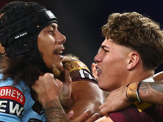 BRISBANE, AUSTRALIA - JUNE 21:  Jarome Luai of the Blues and Reece Walsh of the Maroons scuffle during game two of the State of Origin series between the Queensland Maroons and the New South Wales Blues at Suncorp Stadium on June 21, 2023 in Brisbane, Australia. (Photo by Chris Hyde/Getty Images)