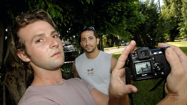 SNAPPY: Doron Aviguy with his amazing picture of a croc attacking friend, Novon Mashiah (right) Picture: Amy Brabin