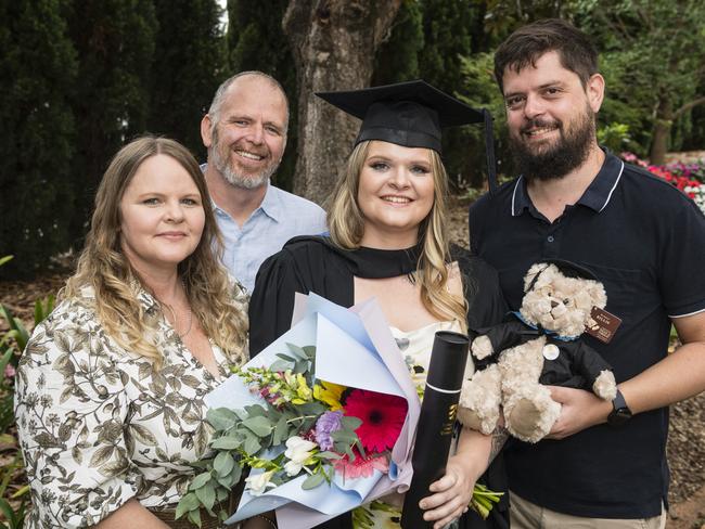 Bachelor of Nursing graduate Courtney-Jane English celebrates with (from left) Michelle Brearley, Craig Brearley and Scott Douma at a UniSQ graduation ceremony at Empire Theatres, Tuesday, February 13, 2024. Picture: Kevin Farmer