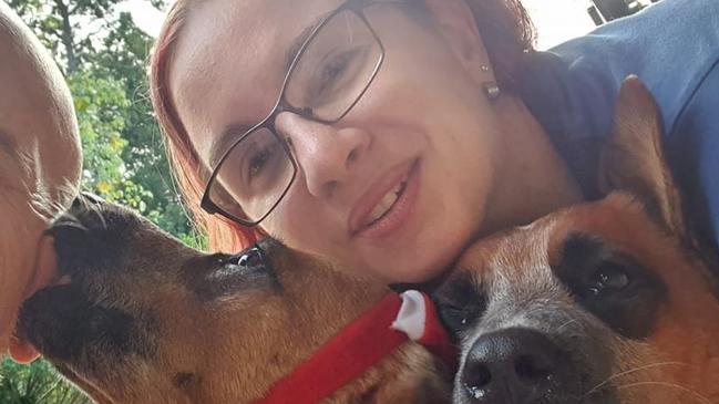 Carla Benson with their dogs Styx and Chopper, who she was walking with her husband Brett on the night of May 25, 2023, when the alleged hit and run happened.