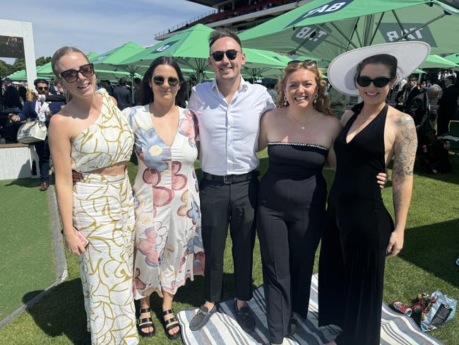 Sophia Olorenshaw, Jess Tester, Ollie Kinsella, Ruth Goddard and Maddison McMaster at Flemington for Derby Day on November 2, 2024. Picture: Phillippa Butt