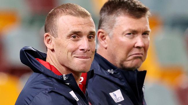 AFL Round 17. 12/09/2020. GWS Giants vs Melbourne at the Gabba, Brisbane..   Simon Goodwin, senior coach of the Demons and CEO Gary Pert     . Pic: Michael Klein