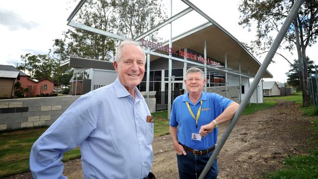 Beenleigh Historical Village President Bill Heck with Secretary Gary Hollindale in front of the new information building.