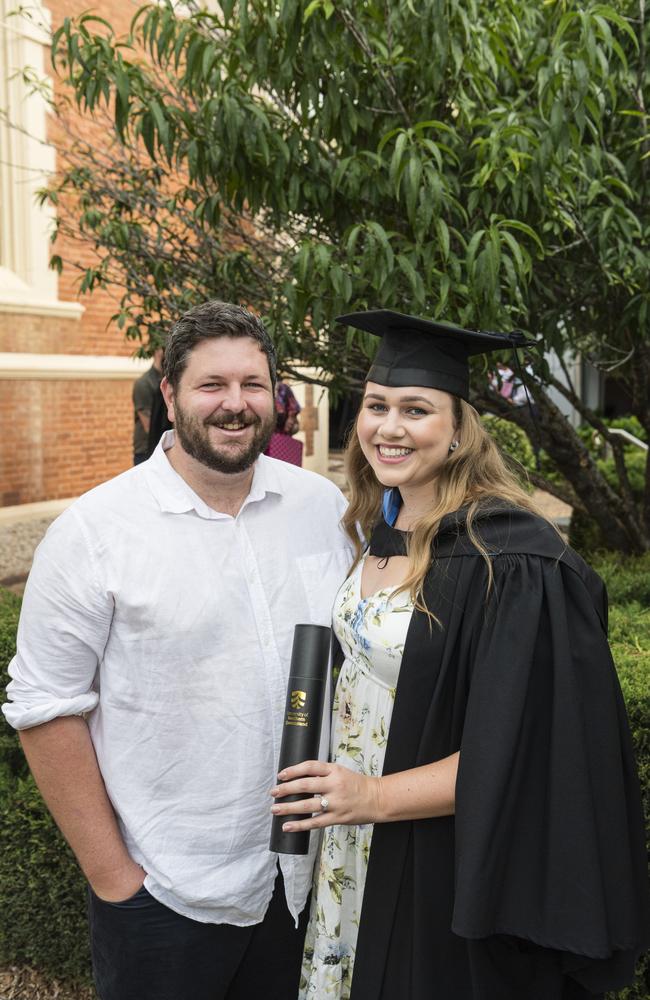 Bachelor of Biomedical Science graduate Lauren Stuart with husband Brendan Stuart at a UniSQ graduation ceremony at Empire Theatres, Tuesday, February 13, 2024. Picture: Kevin Farmer