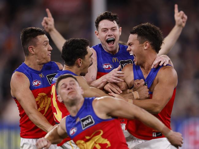 MELBOURNE, AUSTRALIA - SEPTEMBER 21: Cam Rayner of the Lions celebrates a goal during the AFL Preliminary Final match between Geelong Cats and Brisbane Lions at Melbourne Cricket Ground, on September 21, 2024, in Melbourne, Australia. (Photo by Darrian Traynor/AFL Photos/via Getty Images)