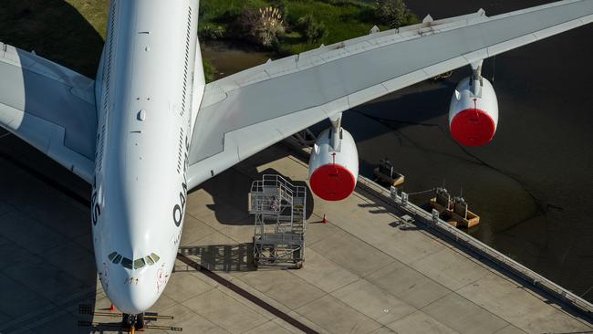 A grounded Qantas plane on the tarmac at Sydney Airport. Picture: Getty Images.