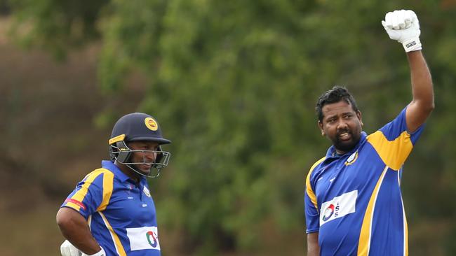 Janaka Liyanabadalge takes in applause for his century for Noble Park. Picture: Stuart Milligan