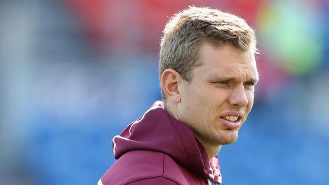 Tom Trbojevic of the Manly Sea Eagles watches on from the sidelines.