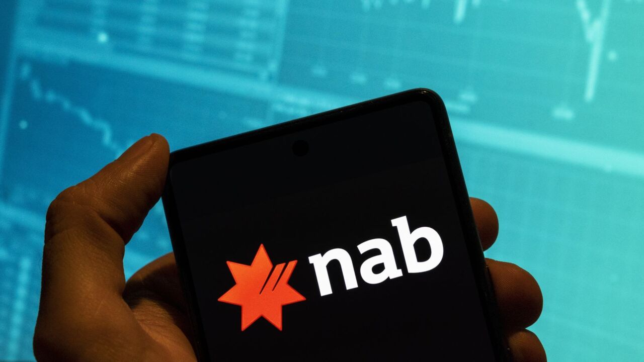 NAB slammed for closure of dozens of branches as customers switch to online banking