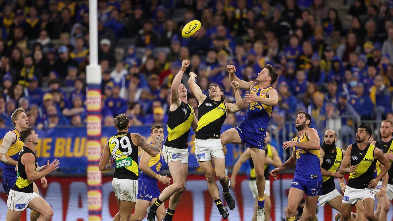 The Tigers’ Dylan Grimes and Liam Baker contest for a mark against West Coast’s Jack Redden. Picture: Paul Kane/Getty Images