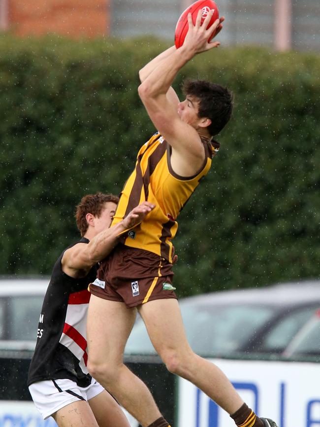 Sam Collins marks strongly over Frankston’s Josh Tynan Picture: Mark Wilson