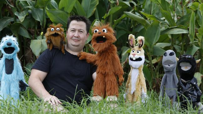 Kellyville's Chris Buckingham with some of the stars of <i>Agoro the Phobic Monster</i>. Pictures: David Swift