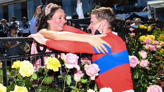 James McDonald embraces partner Katie Mallyon after winning the Melbourne Cup. Picture: Getty Images