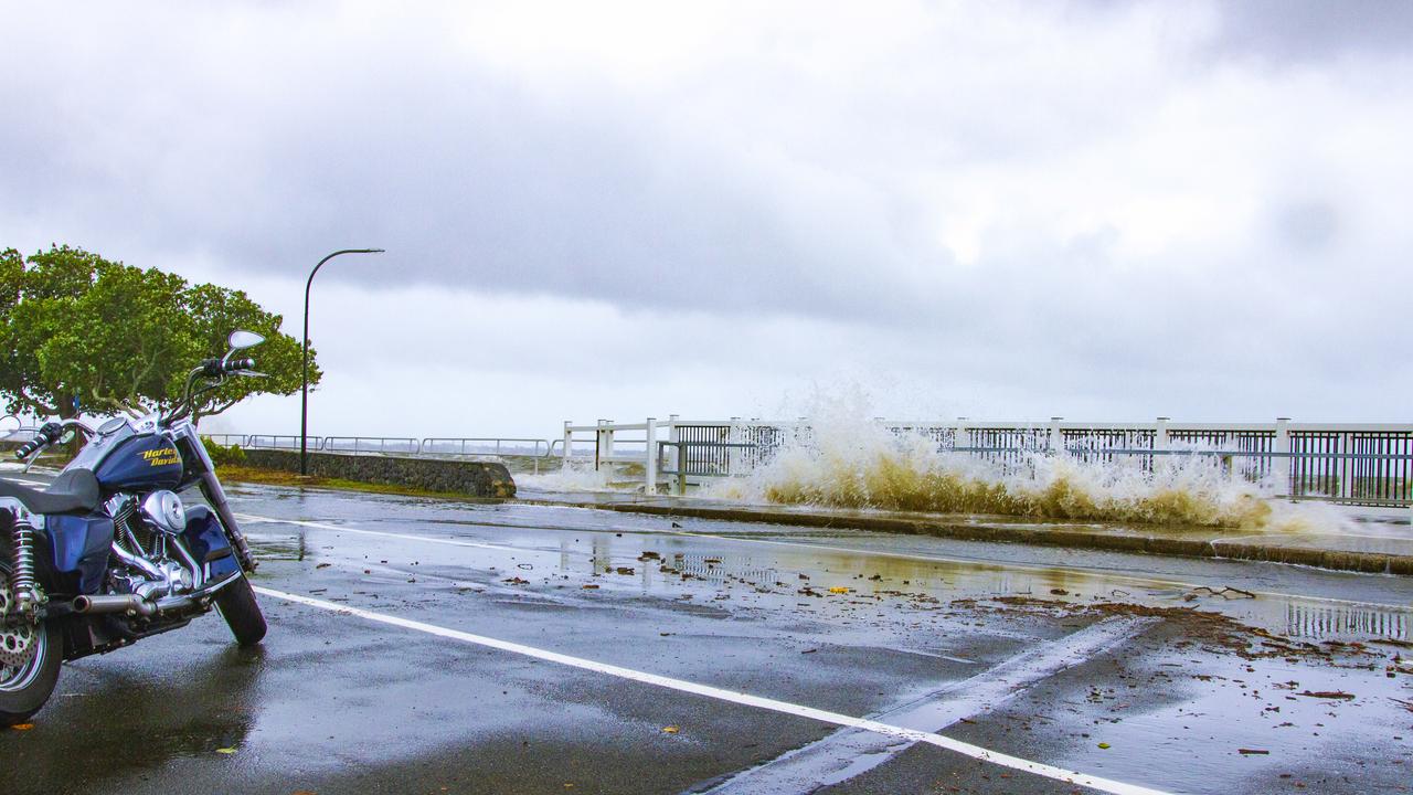 Waves crashing over the street in Sandgate. PHOTO CREDIT: Dianna Jean Photography.