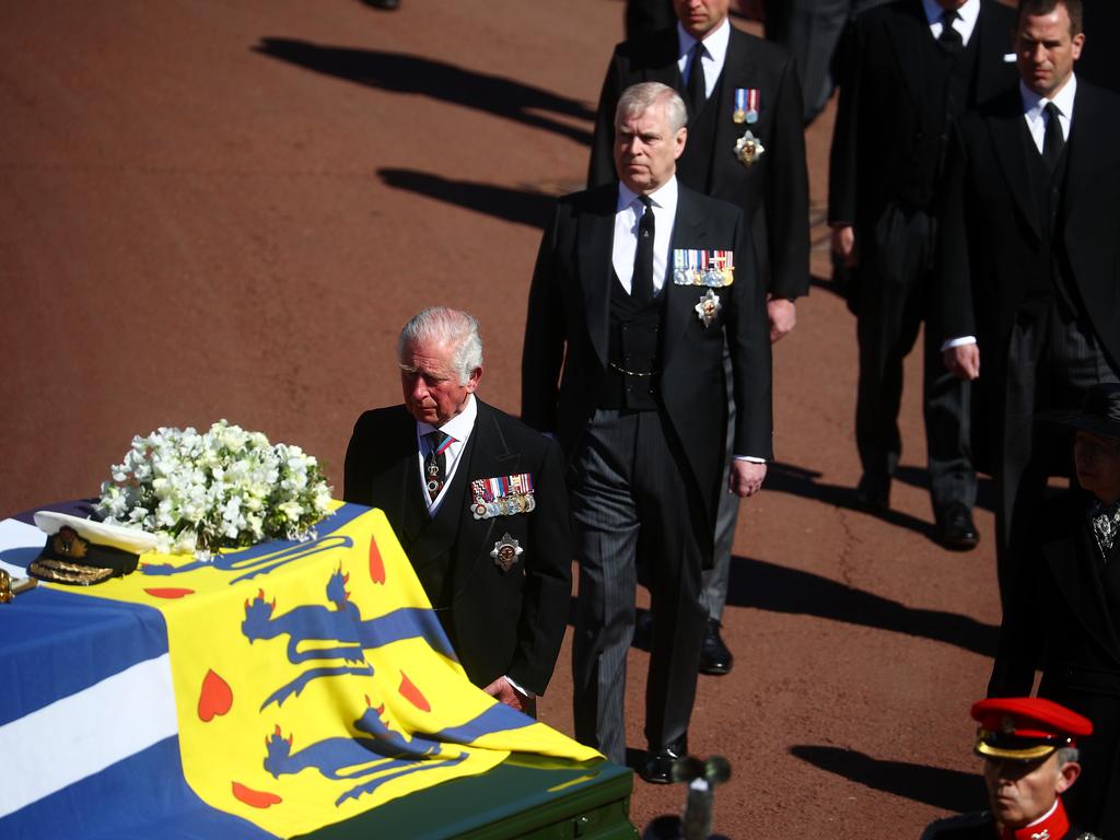 Prince Charles, Prince of Wales and Prince Andrew, Duke of York walk behind The Duke of Edinburgh’s coffin. Picture: Hannah McKay/WPA Pool/Getty Images