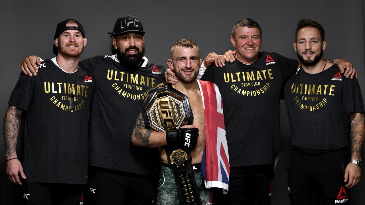 Eugene Bareman (second from left) as part of UFC champ Alexander Volkanovski’s crew. (Photo by Mike Roach/Zuffa LLC via Getty Images)