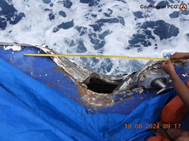 This handout photo taken and released by the Philippine Coast Guard (PCG) on August 19, 2024 shows damage to the Coast Guard ship BRP Cape Engano (MRRV-4411)  following a collision with a Chinese coast guard vessel near Sabina Shoal in disputed waters of the South China Sea. Chinese and Philippine vessels collided on August 19 during a confrontation near a disputed shoal in the South China Sea, the two countries said. (Photo by Ted ALJIBE / Philippine Coast Guard (PCG) / AFP) / RESTRICTED TO EDITORIAL USE - MANDATORY CREDIT "AFP PHOTO / PHILIPPINE COAST GUARD (PCG)" - NO MARKETING NO ADVERTISING CAMPAIGNS - DISTRIBUTED AS A SERVICE TO CLIENTS