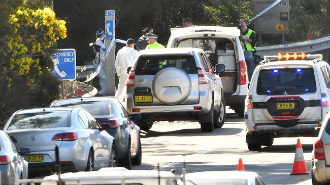 NSW Police established a crime scene on the M1 Highway near Mount Kuring-Gai on July 25. Pic: AAP Image/Joel Carrett