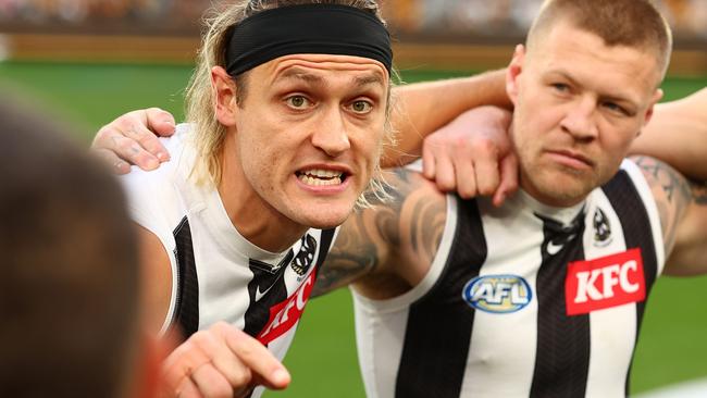 MELBOURNE, AUSTRALIA - JULY 20: Darcy Moore of the Magpies gives instructions during the round 19 AFL match between Hawthorn Hawks and Collingwood Magpies at Melbourne Cricket Ground on July 20, 2024 in Melbourne, Australia. (Photo by Graham Denholm/AFL Photos/via Getty Images)