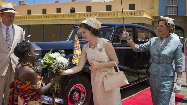 Claire Foy as the young Queen Elizabeth visits Ghana in The Crown.