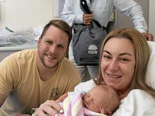 New parents Amanda Crawford and Matthew Laki with their three hour old baby, as member for Clarence Chris Gulaptis delivers them a baby package from the state government. Picture: Adam Hourigan.