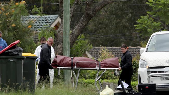 A body is removed from a Tregear home on Monday. Picture: NCA NewsWire / Damian Shaw