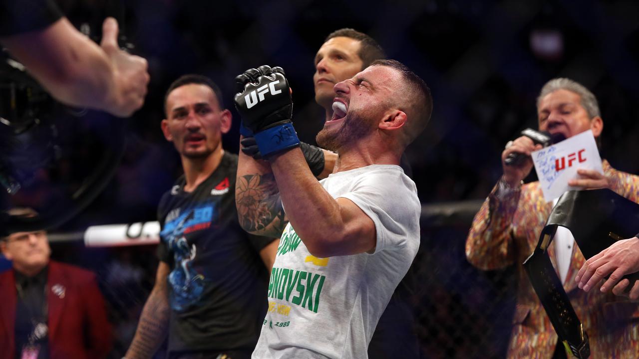 Australia’s Alex Volkanovski celebrates following his win against Max Holloway at UFC 245. Picture: Richard Dobson