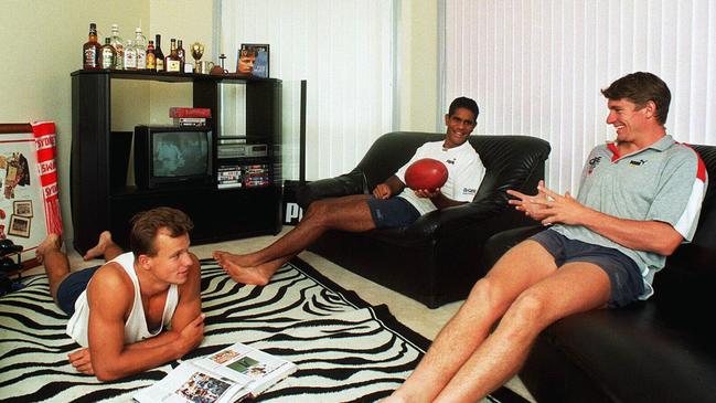 New Crows coach Matthew Nicks (left) with Michael O’Loughlin and Simon Arnott when they were Swans teammates and housemates during the 1990s.