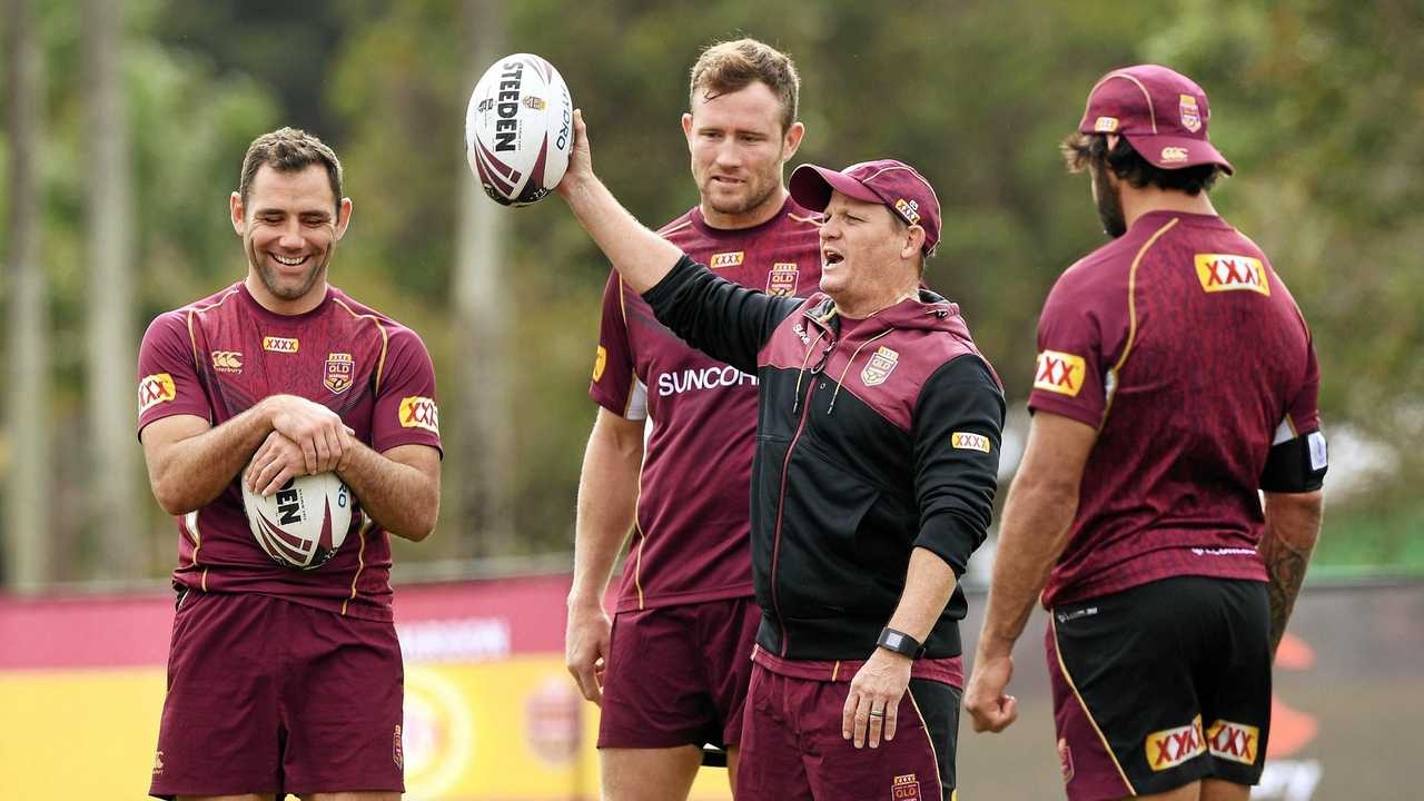 HAVING A BALL: Maroons coach Kevin Walters shares a light hearted moment with (from left) Cameron Smith, Gavin Cooper and Johnathan Thurston during Queensland camp ahead of Game Two last month. Picture: Contributed