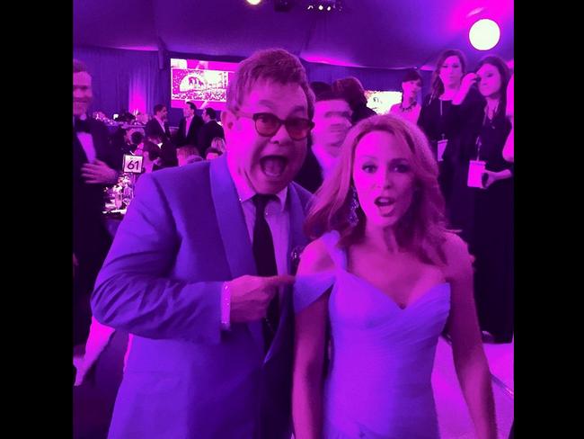 Elton John at Oscars 2015 party via Instagram, “Look who stopped by?!?!? @ejaf @kylieminogue #Oscars”