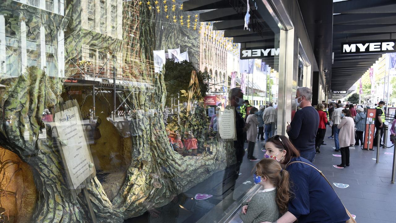 Crowds gather around the Myer Christmas windows in the Bourke Street Mall in central Melbourne. Picture: NCA NewsWire/Andrew Henshaw