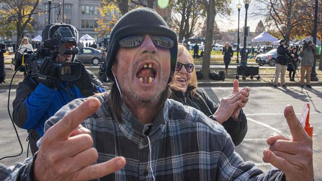 A man celebrates after the Rittenhouse verdict in front of the Kenosha County Courthouse in Kenosha. Picture: Alex Kent/AFP