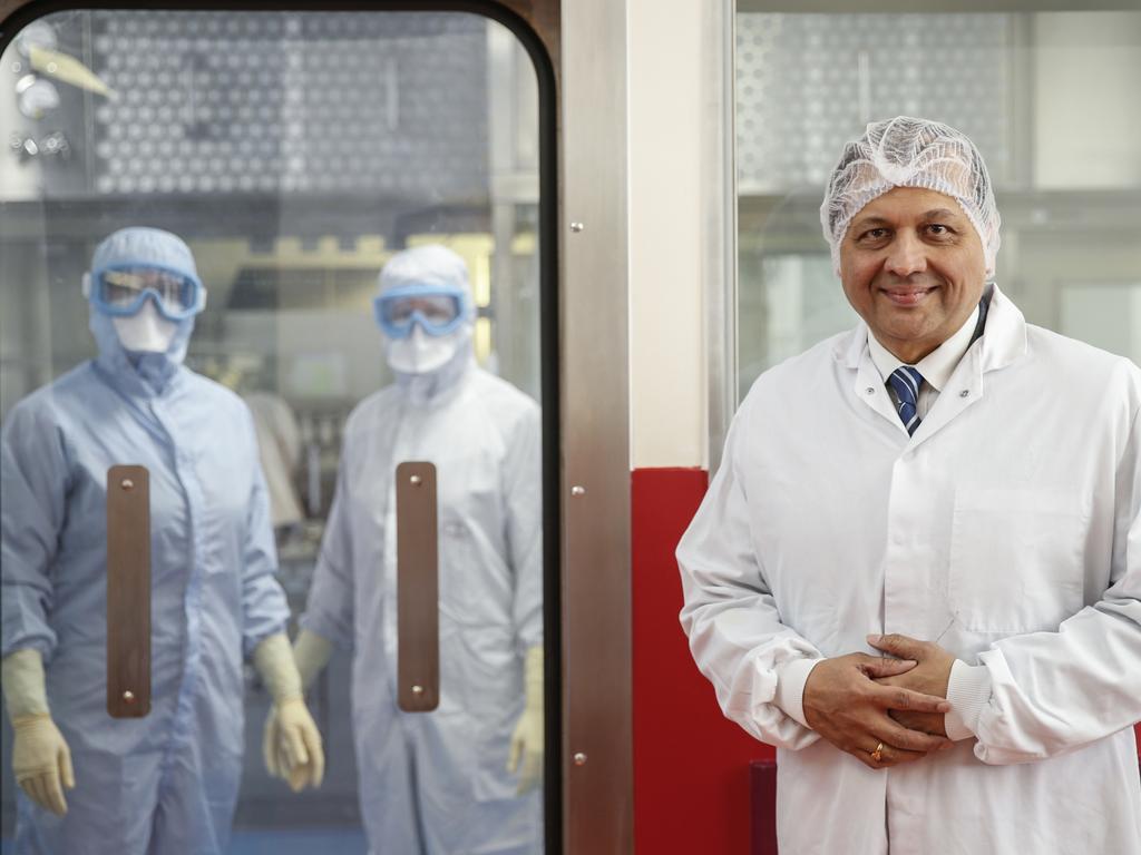 Ravi Limaye, managing director of Wockhardt UK, pictured with manufacturing workers at their production line in Wrexham, North Wales. Picture: Hollie Adams