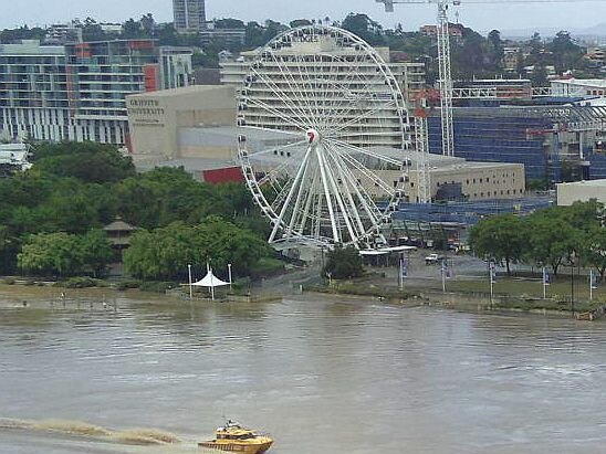 Coast guard award flood 2011 - Coast Guard vessel CG-20 passes South Bank on the day one of the flood, Brisbane - Photo Supplied