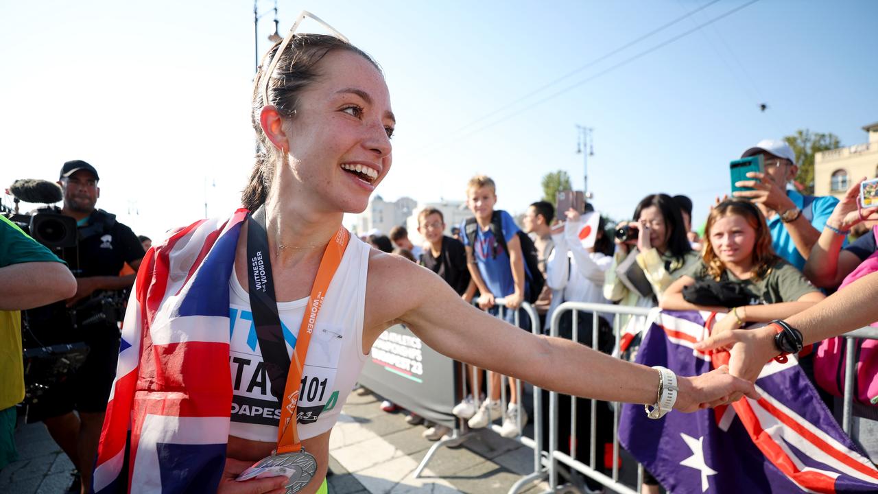 Silver medallist Jemima Montag of Team Australia celebrates with fans