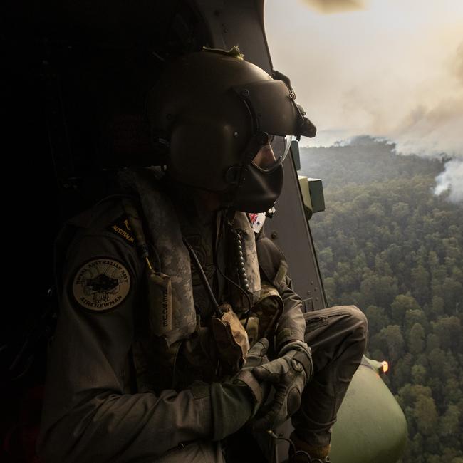 RAN Leading Seaman Ben Nixon assesses the Tianjara Fire. Picture: ADF