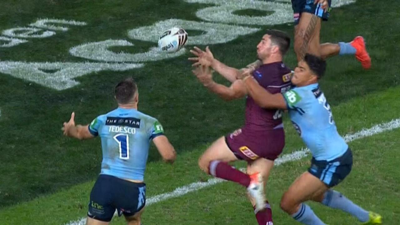 Latrell Mitchell drags back Matt Gillett