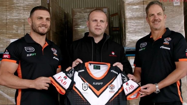 FAB Industrial Logistics managing director Neil Fabry (centre) with Wests player Robbie Farah and former CEO Justin Pascoe.