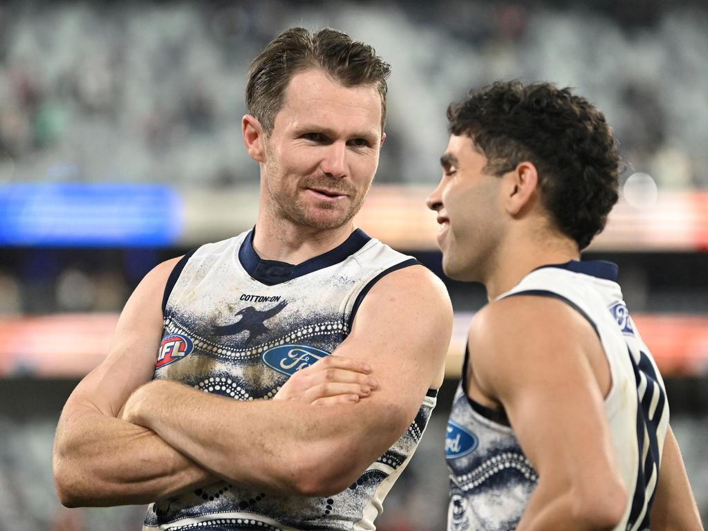 GEELONG, AUSTRALIA - JULY 02: Patrick Dangerfield of the Cats chats with Tyson Stengle of the Cats following the round 16 AFL match between the Geelong Cats and the North Melbourne Kangaroos at GMHBA Stadium on July 02, 2022 in Geelong, Australia. (Photo by Morgan Hancock/Getty Images)