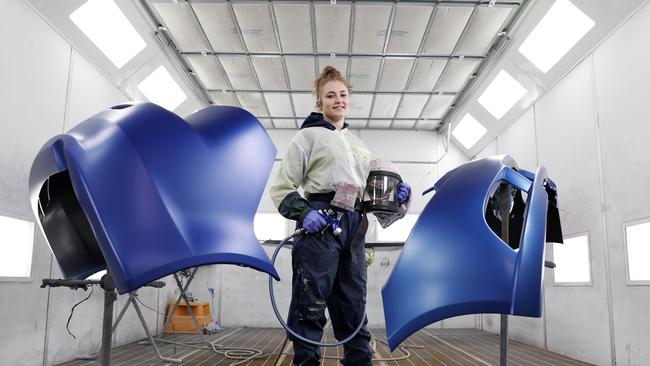 Car costs are risking, including for smash repairs. Apprentice spray painter Isabella Turrise. Picture: Jonathan Ng