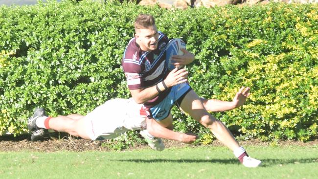 Cooper Marshall goes in for one of his two tries in the Intrust Super Cup clash with the Redcliffe Dolphins on Sunday. Photo: Jann Houley