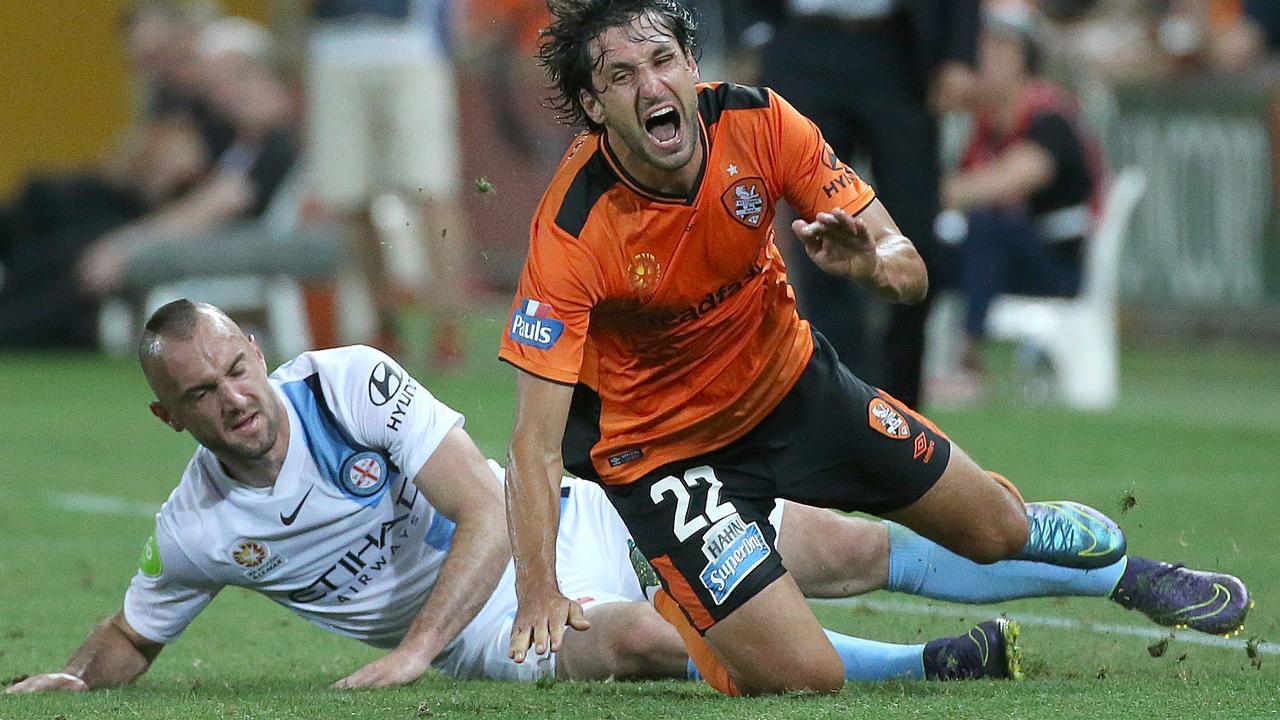 Former Brisbane team mate, Ivan Franjic takes down Thomas Broich and earns a yellow card. Brisbane Roar Vs Melbourne City at Suncorp Stadium. Pic Jono Searle.