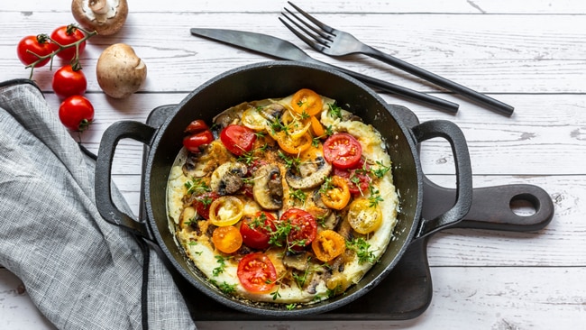 Use up any vegetables you have in the fridge by cooking them up as an omelette. Image: Getty