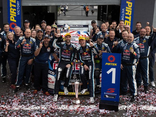 Triple Eight Racing celebrate their win after Shane van Gisbergen and Garth Tander drove the #97 Red Bull Holden Racing Team Holden Commodore ZB to victory. Picture: Mark Horsburgh/Edge Photographics via Getty Images