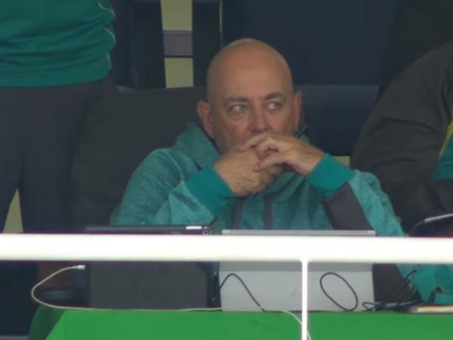 25/03/2018 Australian Cricket coach Darren Lehmann speaking on a walkie talkie to Peter Handscomb.