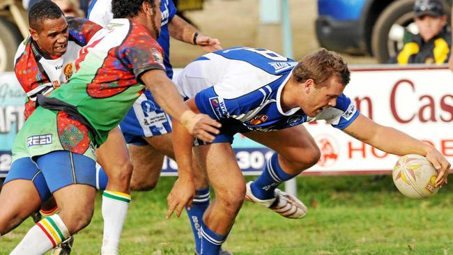 BACK IN BLUE: Danny Wicks stretches out to score a try for Grafton Ghosts against Northern United Dirrawongs in 2010.