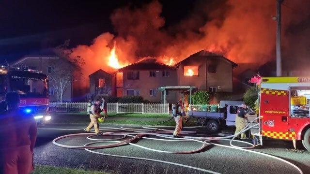 FRNSW firefighters extinguishing a house fire in Taree. Picture: Fire and Rescue NSW