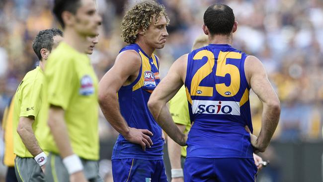 Hurn and Matt Priddis after the 2015 losing grand final which he says made him appreciate this year more.