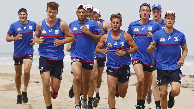 Lachie Hunter leads his group back up the beach. Picture: Michael Klein